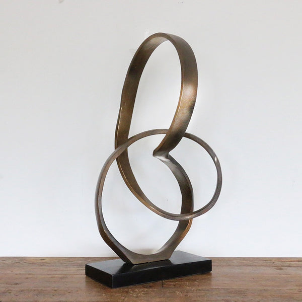 Infinity Sculpture in Antique Brass