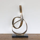 Infinity Sculpture in Antique Brass